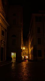 Buildings in city at night
