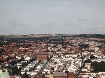 Aerial view of town against sky