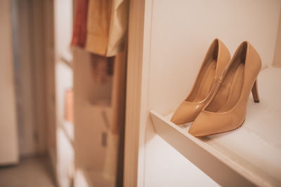 Close-up of clothes hanging on rack