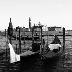 Gondolas in grand canal with santa maria della salute in background in venice