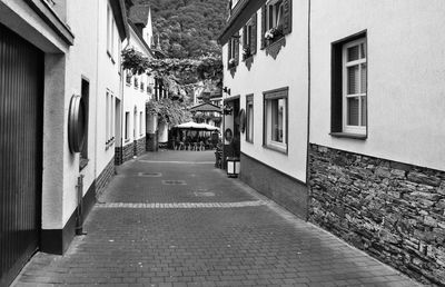 Narrow alley amidst buildings in city