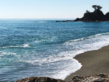 Scenic view of sea against clear sky