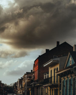 New orleans homes against a gloomy sunset