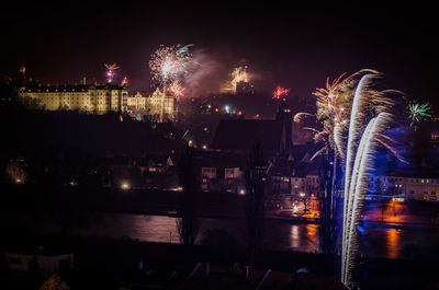 Fire crackers against built structures at night