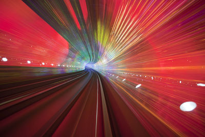 Light trails on illuminated tunnel