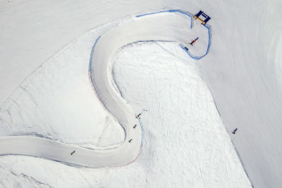 High angle view of snow covered field