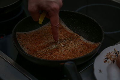 High angle view of person preparing food