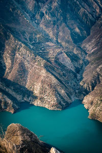 High angle view of lake by mountain