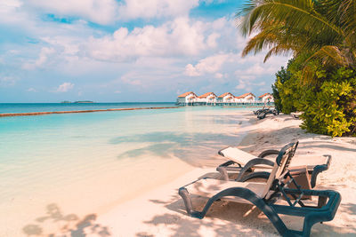 Scenic view of beach against sky