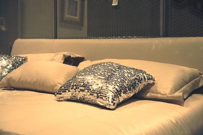 Close-up of sofa on bed at home