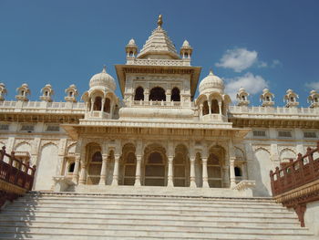 Low angle view of umaid bhawan palace in city against sky