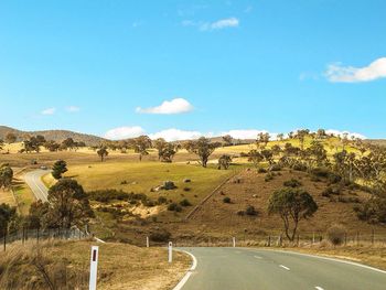 Country road passing through landscape