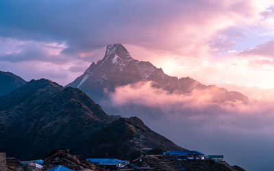 Scenic view of mountains against sky during sunset