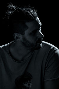 Portrait of young man looking away