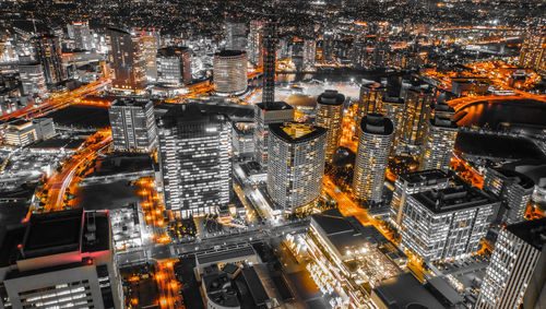 High angle view of illuminated cityscape