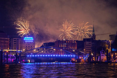 Firework display at night