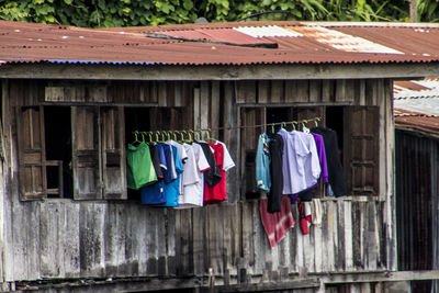 Clothes drying outside house