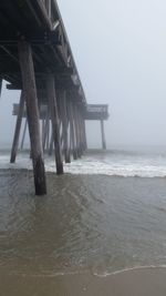 Pier on sea against sky