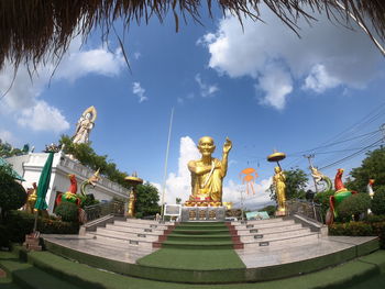 Statue of temple against sky