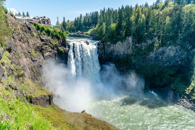 A view of snoqualmie falls on a powerful day in washington state.