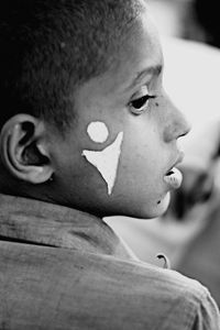 Close-up of boy looking away