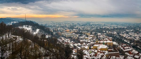 High angle view of townscape against sky during sunset