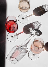 High angle view of wine glasses on table