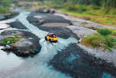 High angle view of small toy car on road