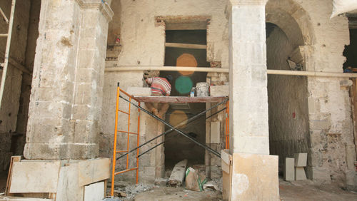 Man working in old building