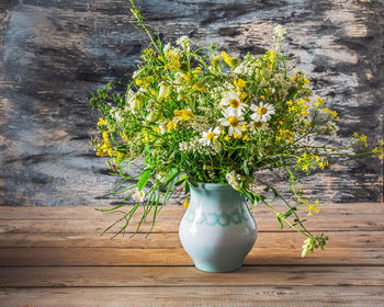 Close-up of flower pot on table