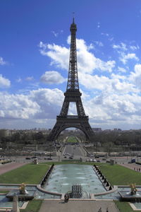 View of tower against cloudy sky