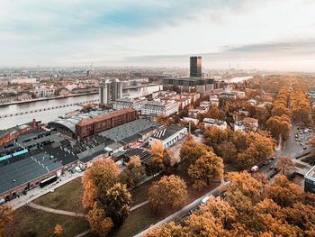 Aerial view of city against sky