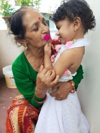 Mother and girl with dog