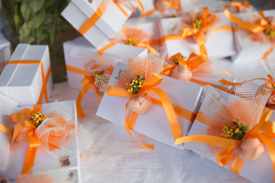 Close-up of orange flowers on table