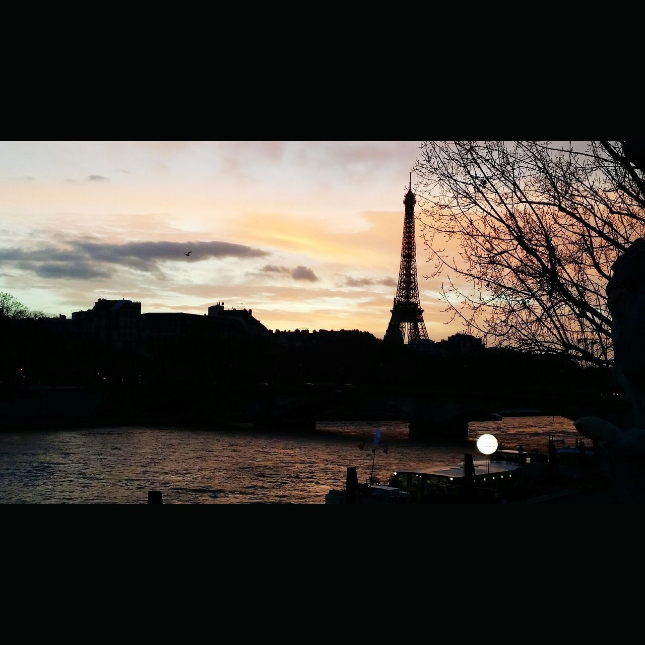 silhouette, architecture, built structure, sunset, building exterior, sky, river, water, city, dusk, cloud - sky, tree, transfer print, auto post production filter, outdoors, dark, reflection, tower, travel destinations, nature