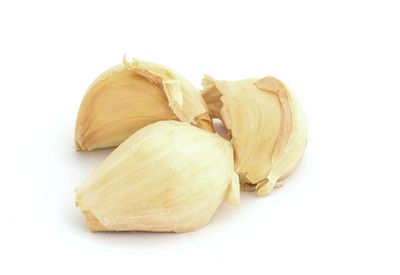 Close-up of banana against white background