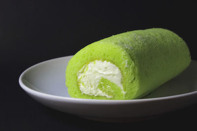 Close-up of green fruit in bowl