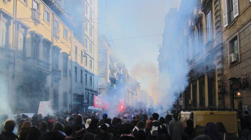 People standing amidst buildings