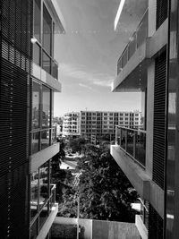 Buildings in city against sky