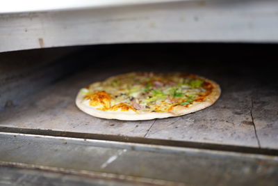 High angle view of pizza on table