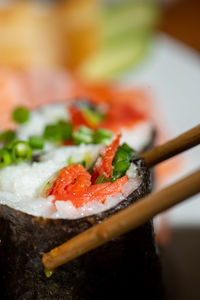 Close-up of sushi served on table