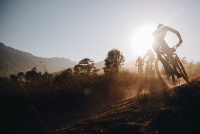 People riding bicycles