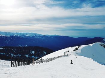 Scenic view of snowcapped mountain against sky