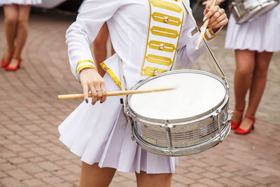 Musicians performing on street in city