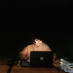 Man using laptop on table