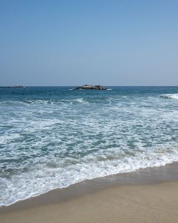 Scenic view of sea against clear sky