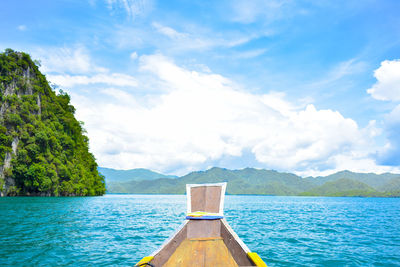 Scenic view of swimming pool by sea against sky