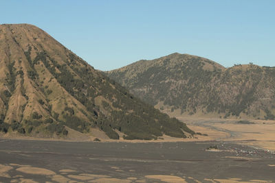 Scenic view of mountains against clear sky