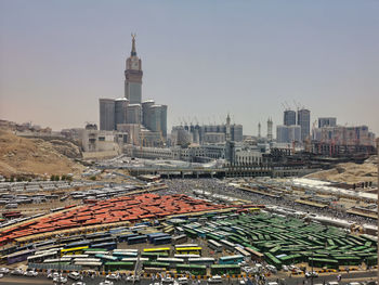 Aerial view of buildings in mecca city against clear sky