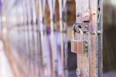 Close-up of padlock on metal door